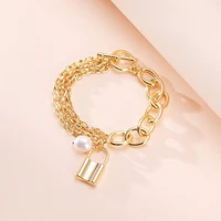 ornapeadia personalized fashion hollow metal element bracelet for women pearl ot buckle irregular chain retro small lock pendant