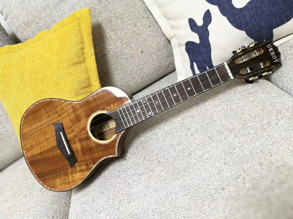 

Full veneer Acacia ukulele 23/26 inch light