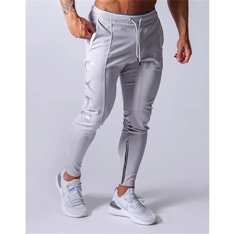 

Sports pants men's jogger fitness sports trousers new fashion printed muscle men's fitness training pants