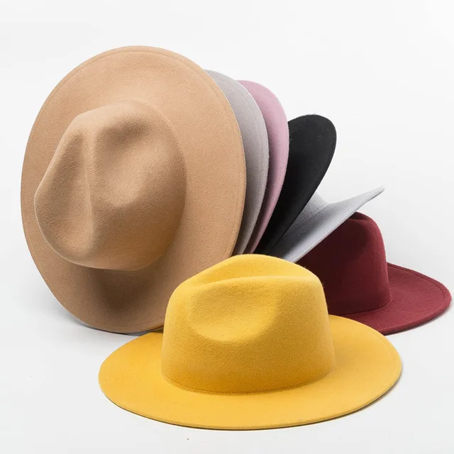A collection of eleven mostly trilby type hats, many by CA4LA