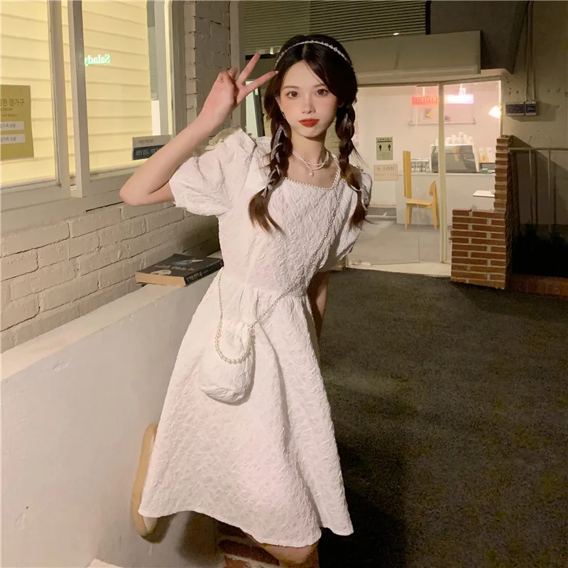 

Vestido de mujer French Pearl Square Collar Dress Summer 2021 New Close Waist First love Bubble Short sleeve Small White Skirt