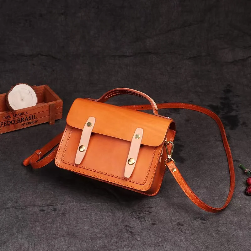 

Vegetable tanned top layer cowhide retro female bag college Cambridge bag small square bag Europe and South Korea messenger bag