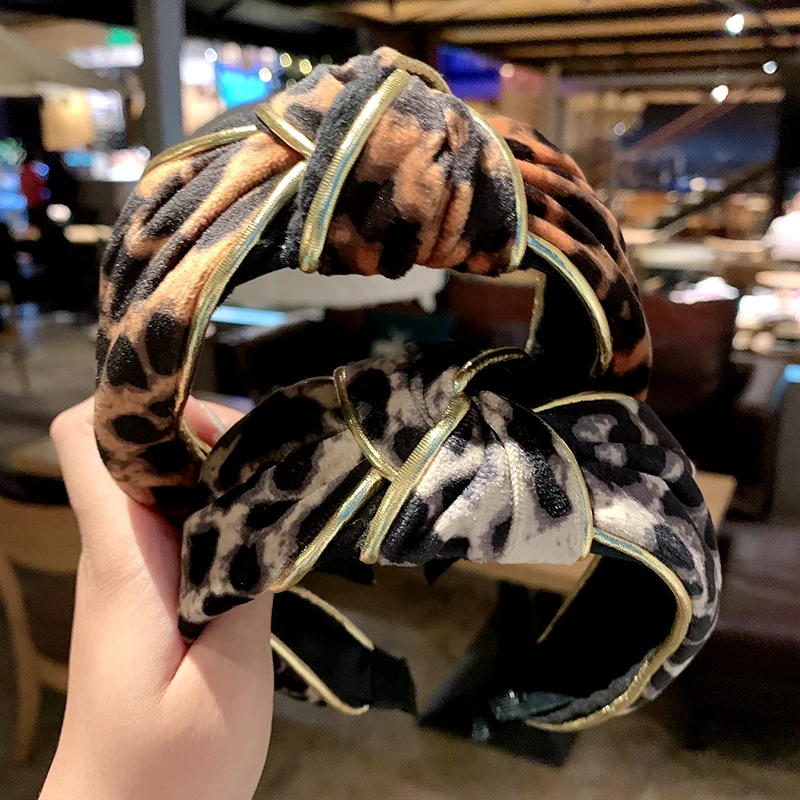 Женская элегантная леопардовая повязка на голову с золотыми линиями и узлом