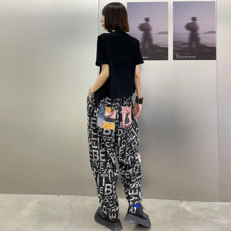 

[EAM] High Waist Wide Leg Black Letter Print Irregular Jeans New Loose Women Trousers Fashion Tide Spring Autumn 2021 1DD7577