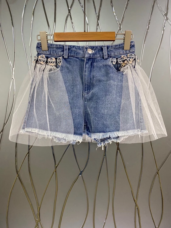 

2021 new women fashionable symmetrical pockets with mesh, perspective stitching and beard trimming denim shorts 622