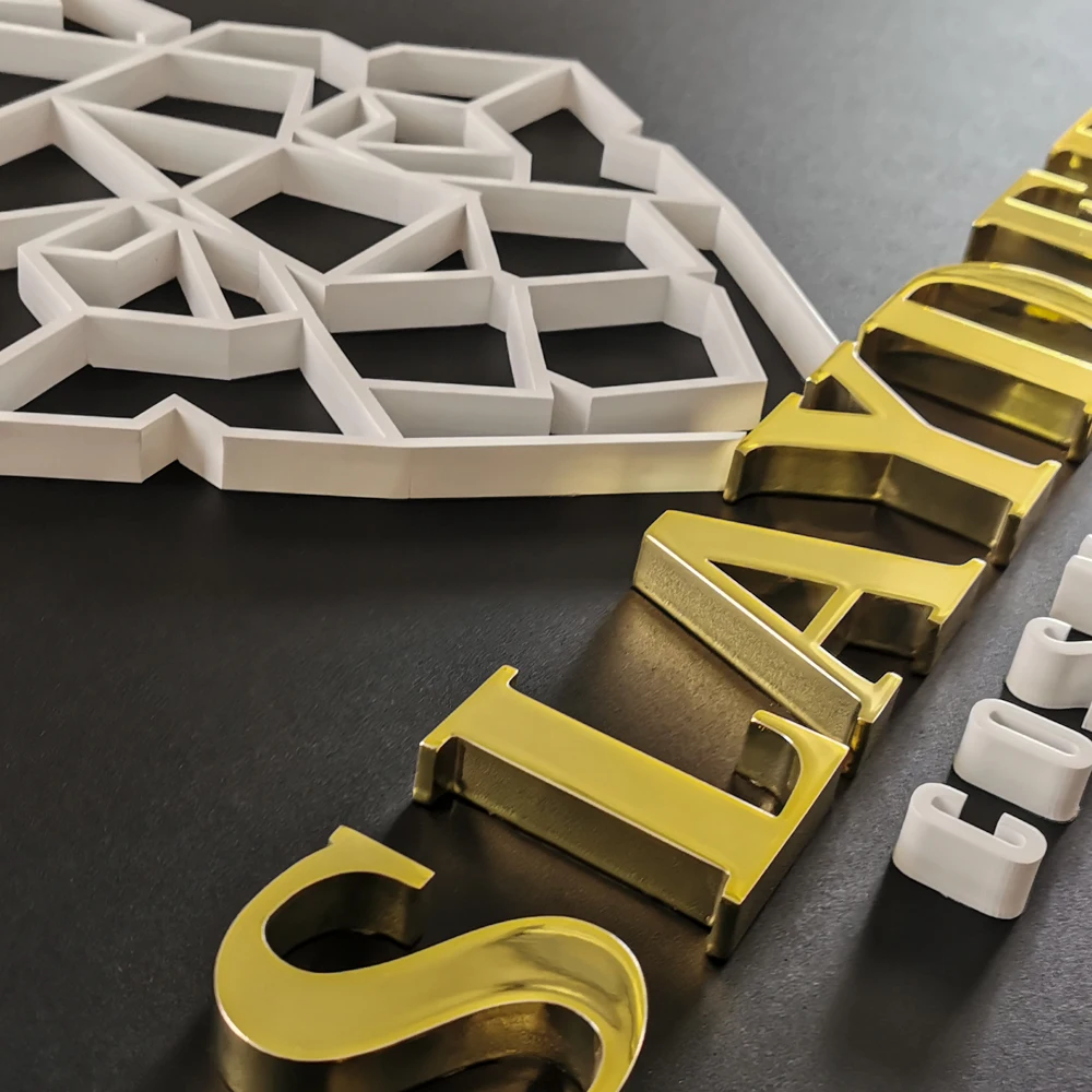 three-dimensional non illuminated gold finishing metal signage