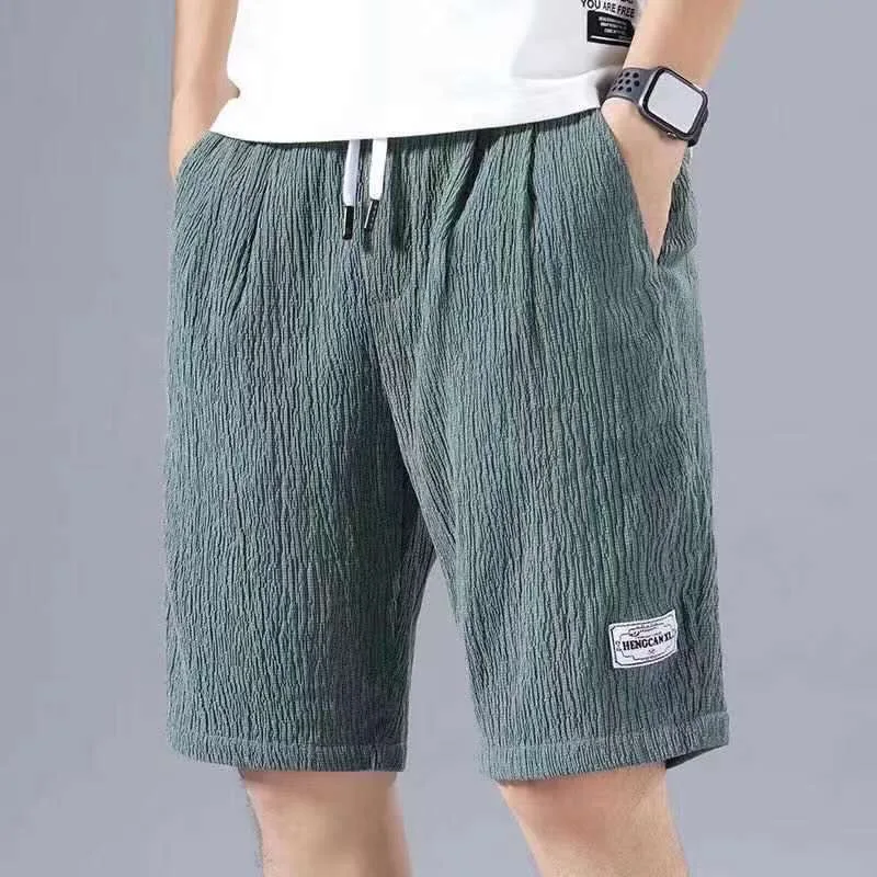 

2021 Summer Shorts Men's Ice Silk Breathable Loose Sweatpants Male Solid Color Drawstring Printed Casual Shorts