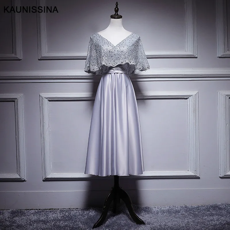 Длинное атласное вечернее платье с бусинами коротким рукавом и V-образным - Фото №1