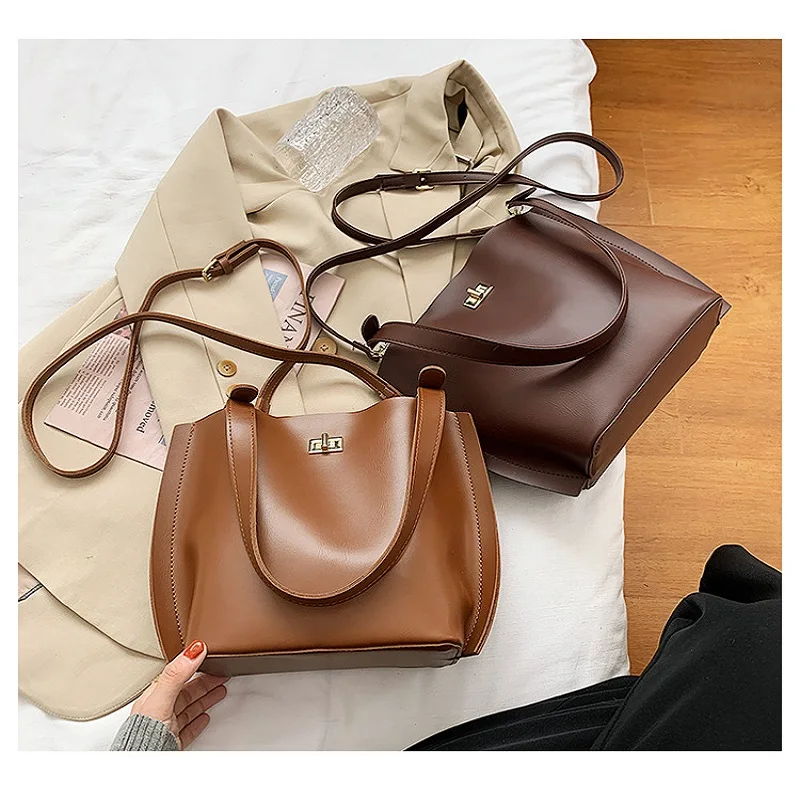 

2020 Brand Designer Women PU Leather Handbag Shoulder messenger Bag Ladies Large capacity broadband Fashion Solid bucket bag