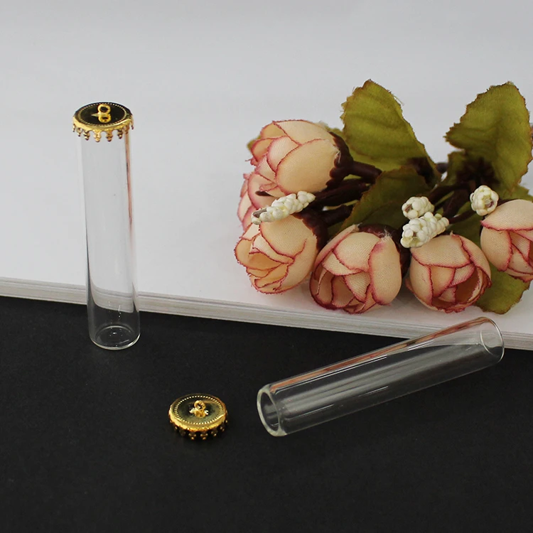 Стеклянная трубчатая бутылка с короной и металлической крышкой стеклянные