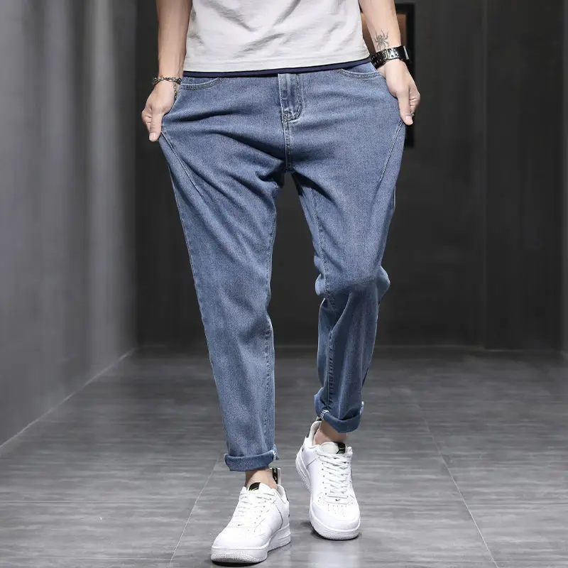 2021Men's Jeans loose-fitting trend spring summer casual Korean HK version slim small feet stretch straight blue black pants