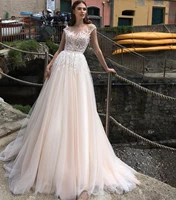 boho wedding dress a line o neck cap sleeve lace appliques sashes backless tulle floor length sweep train bridal gown 2021