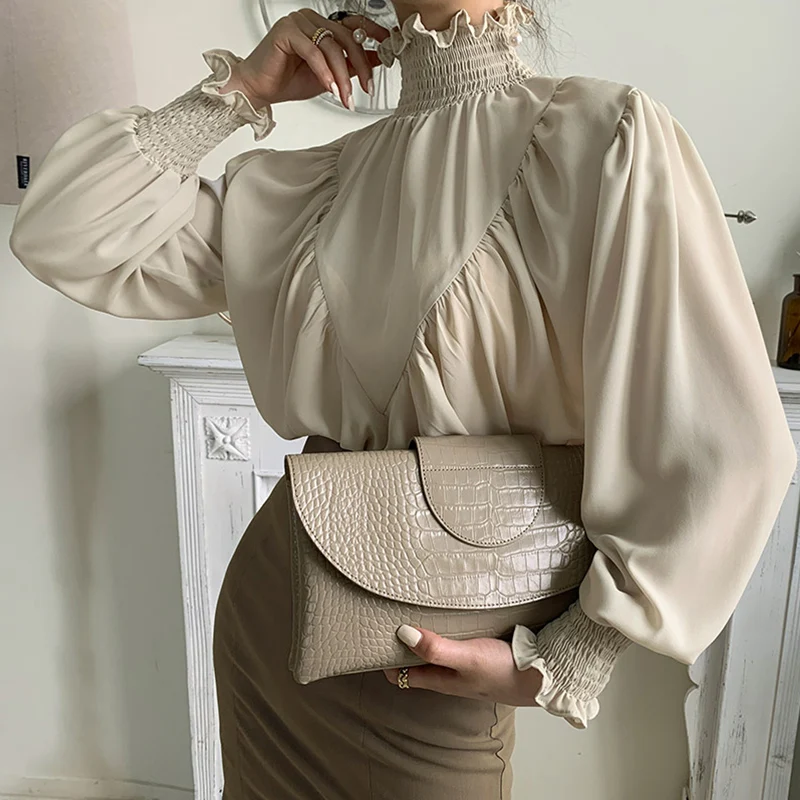 

RUGOD2021spring ruffled solid color shirt elegant fashion solid color shirt temperament ruffled spring shirt 2021 new female top