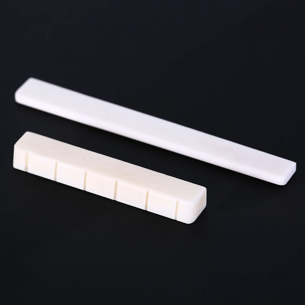 

1pc Guitar Bone Nut Size 52mm x 6mm x 9/8.5mm And 1pc Lassical Guitar Bone Bridge Saddle