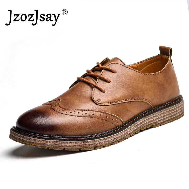 Мужские туфли броги с резным кружевом классические черного цвета деловые