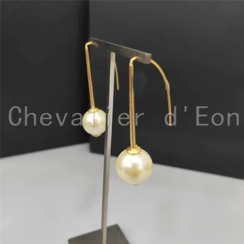 

Каплевидные серьги-подвески с жемчужинами и кисточками