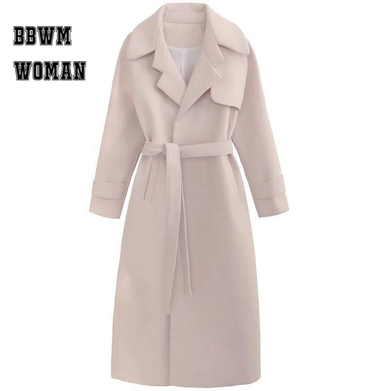 Женское шерстяное пальто с лацканами абрикосовое длинное поясом на зиму 2019 |