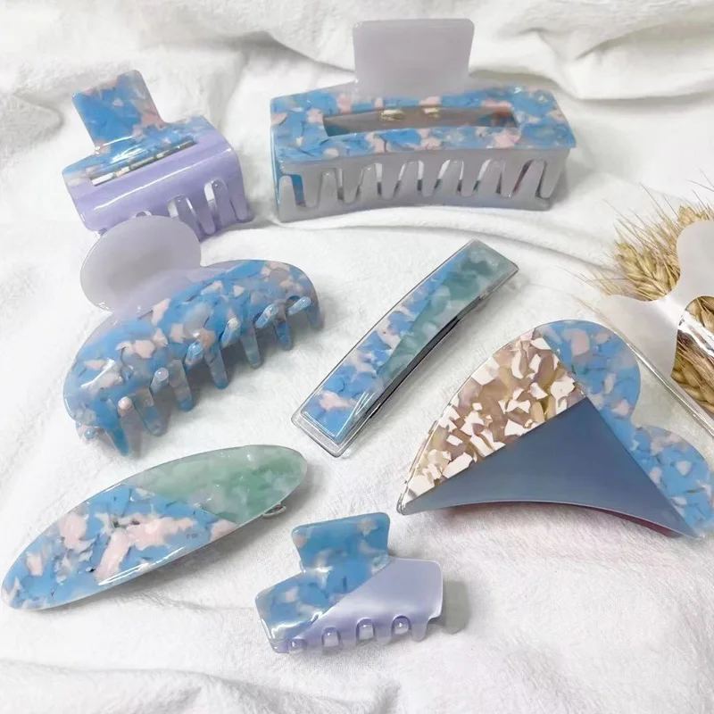 

Женская заколка для волос с голубым геометрическим принтом