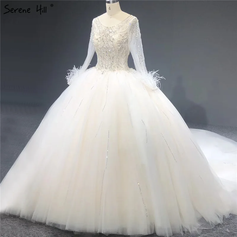 Белое блестящее роскошное свадебное платье с длинным рукавом и круглым вырезом