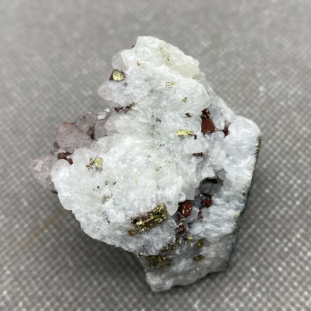 

Natural red crystal coexists with chalcopyrite