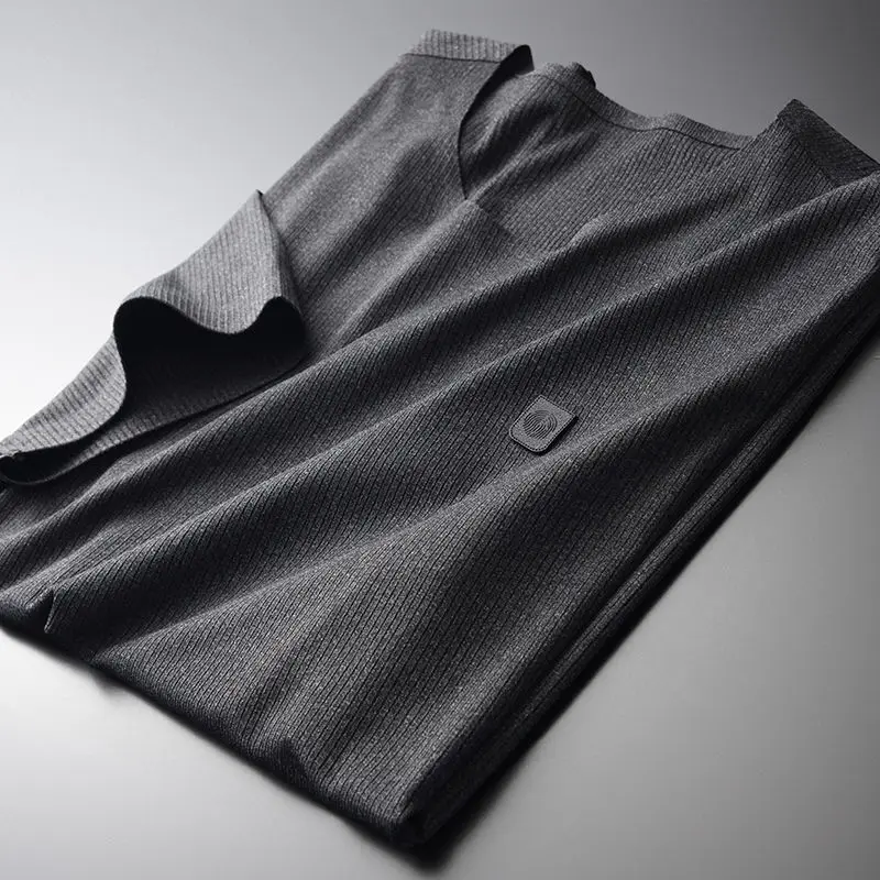 

Laser cutting technology of no lock edge pressing glue fashionable short sleeve t-shirt men's round neck slim trend solid color