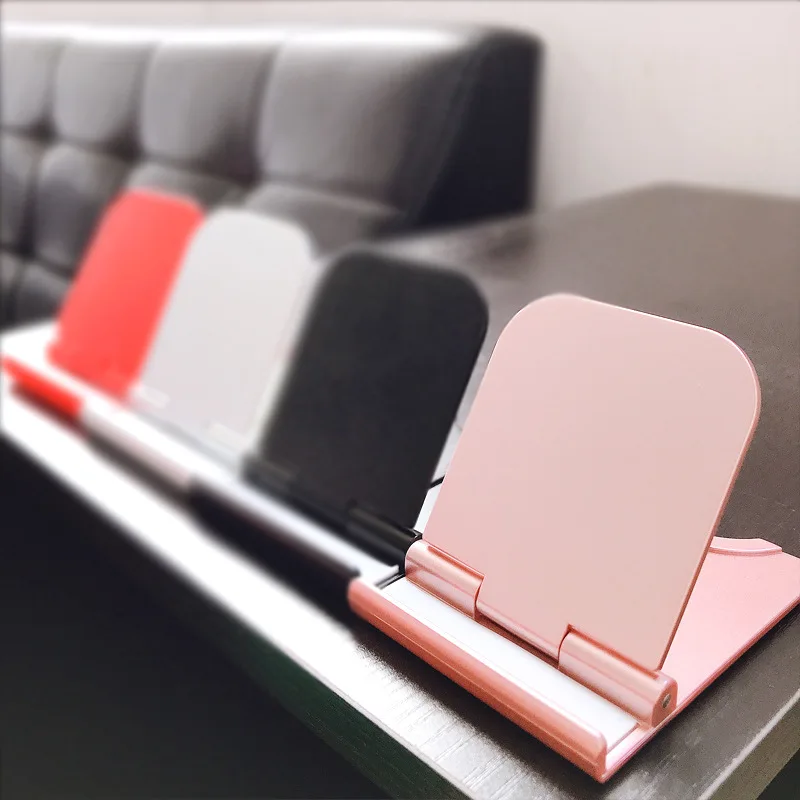 

Desktop folding mobile phone stent creative portable multi-purpose lazy bracket custom logo base small support frame