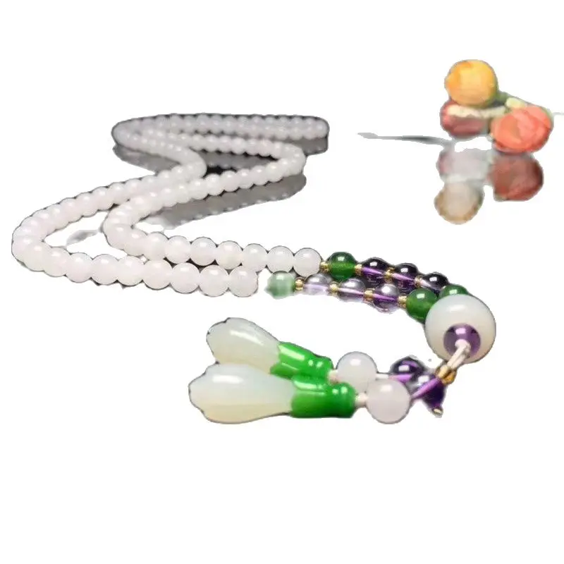 

Цепочка на свитер с натуральным китайским цветком магнолии