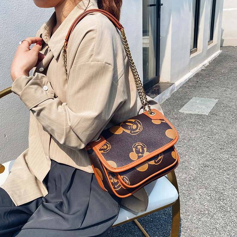 

Disney Cute Printed Canvas 2021 New Casual Chain Large-capacity Multi-function Cosmetic Bag Ladies Wallet One-shoulder Handbag