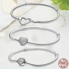 Женский браслет-цепочка серебряного цвета с подвеской в виде сердца