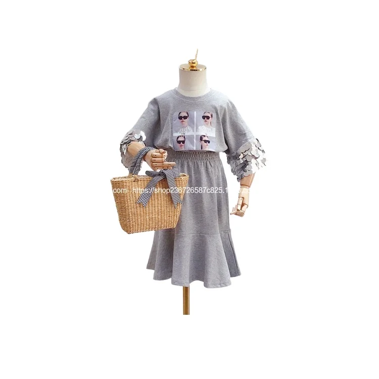 

Children's dress 2020 summer new girl's print head picture Sequin splicing girl's elastic waist dress trend