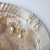 s925 silver needle plated 14k real gold natural freshwater pearl handmade earrings female bow zircon earrings cute earrings