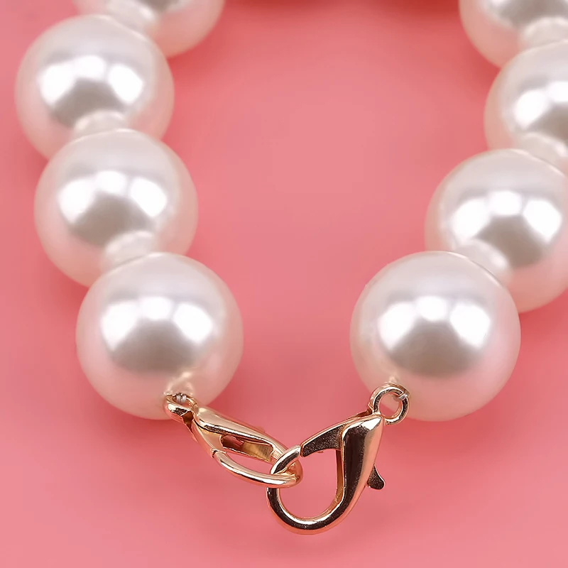 Короткая сумка с имитацией жемчуга и бусинами на ремнях короткий наплечный