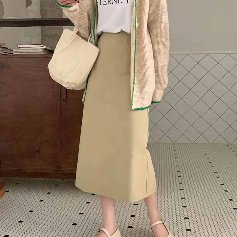 Женская юбка с разрезом однотонная трапециевидная средней и длинной длины