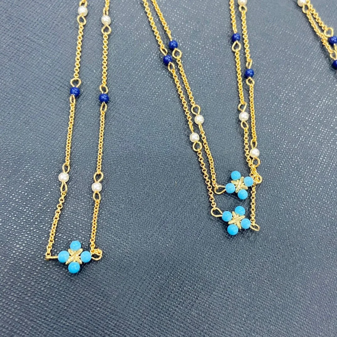 Женское ожерелье из серебра пробы с жемчугом и синим камнем | Украшения