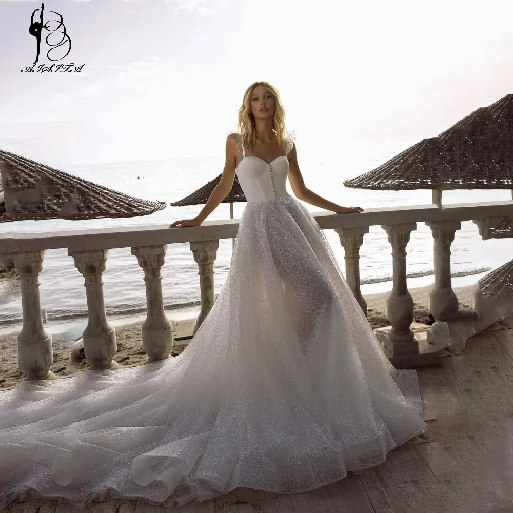 

Vintage Lace A-Line Wedding Dress Sweetheart Neck Sleeveless Spaghetti Straps Floor Length Backless Sash Pearl Bridal Gowns