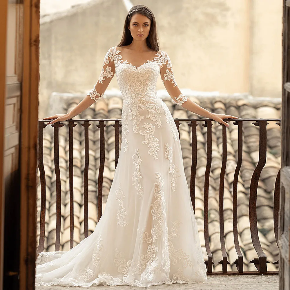 

Hot Sale A-Line Wedding Dresses Illusion O Neck Three Quarter Sleeves Appliqued Button 2021 Floor Length Bridal Gown