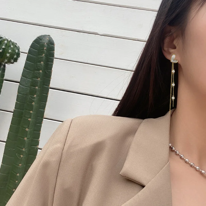 

XIYANIKE Tassel Long Drop Earrings White Love Heart Earrings Female Temperament 2020 New Trendy Fairy Korean Golden Ear Jewelry