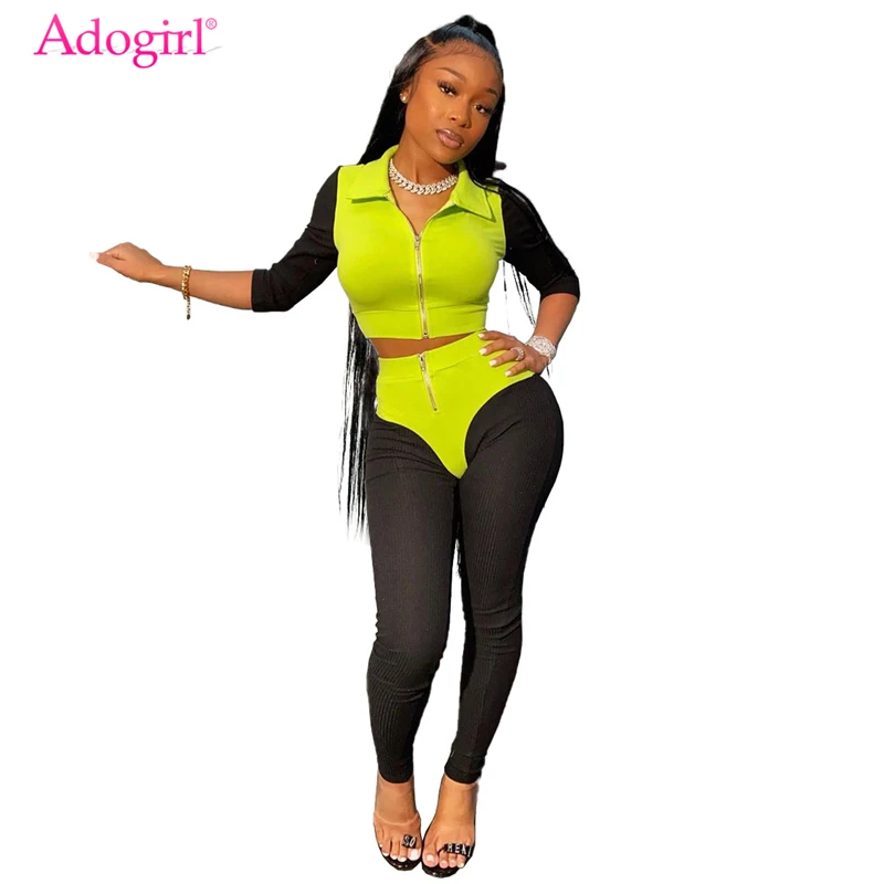 

Костюм спортивный женский трикотажный составного кроя с отложным воротником и длинным рукавом