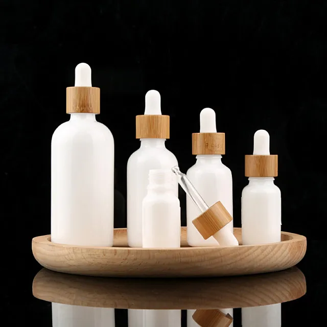 

dropper bottle 100/pcs 10ml 15ml 20ml 30ml 50ml 100ml porcelain white glass with bamboo lid Portable Empty Container