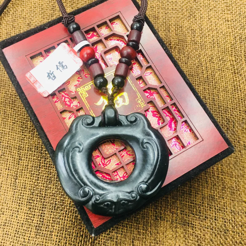 

Natural black stone hand-carved black hollow good luck lock pendant necklace men and women sweater chain