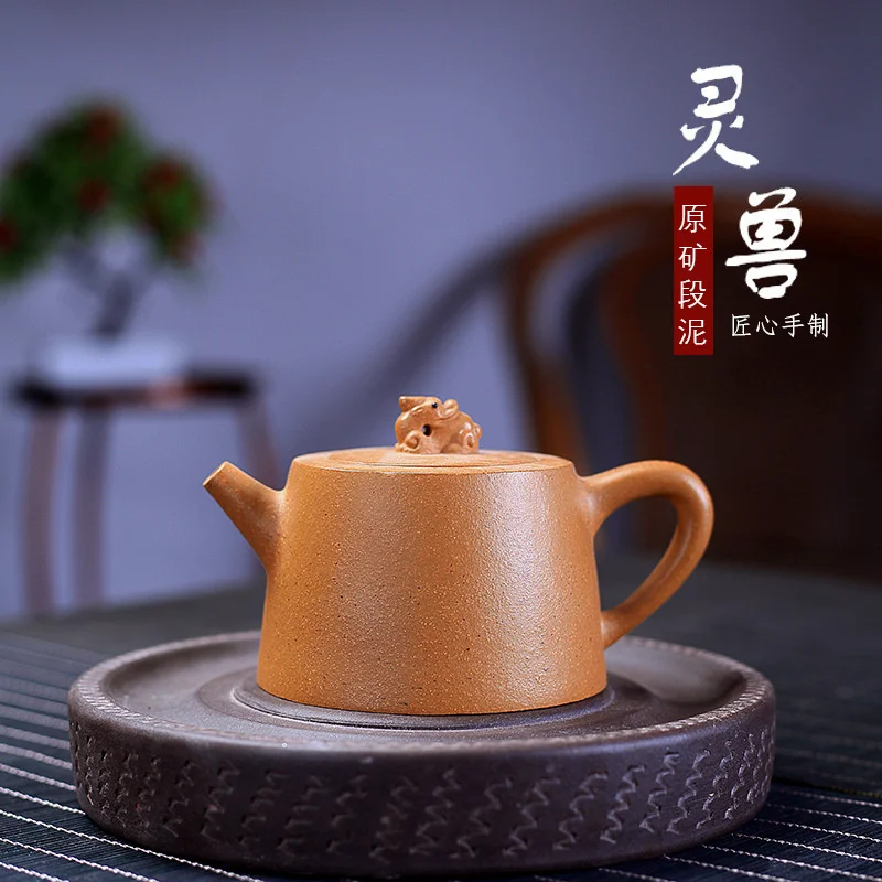 

Yixing фиолетовый глиняный горшок ручной работы Подлинная грязь одиночный горшок чайный набор Jinglan дух чудовище горшок в сырой чайник руда сек...