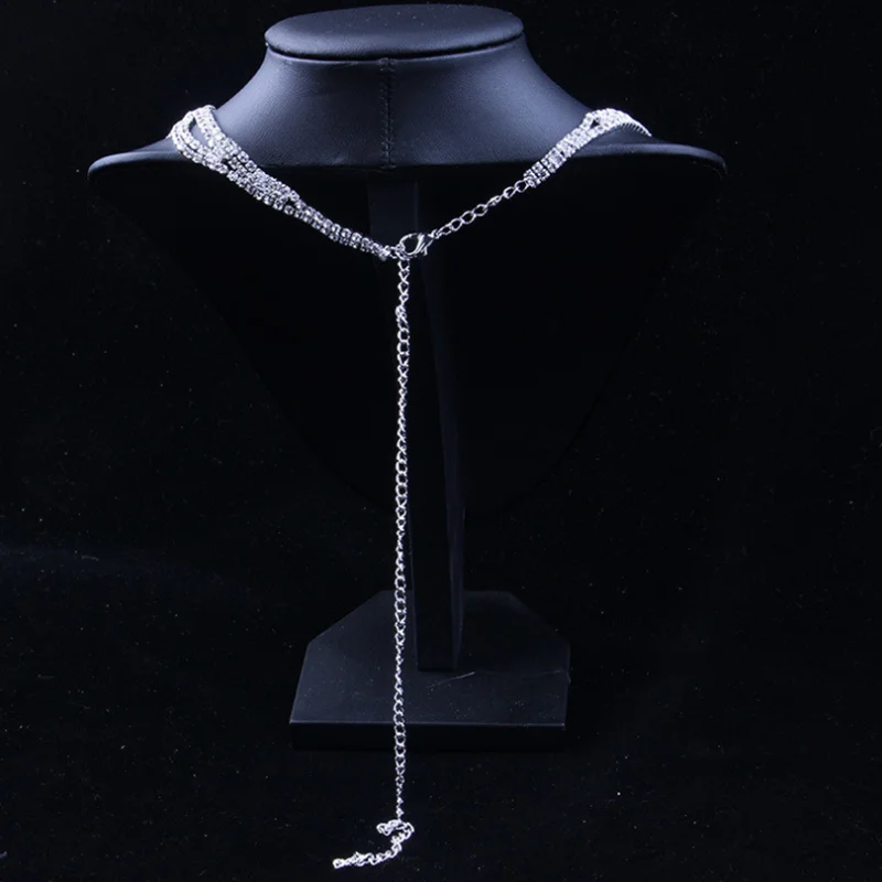 

Two-piece bridal suit, earrings and necklace, rhinestone chain