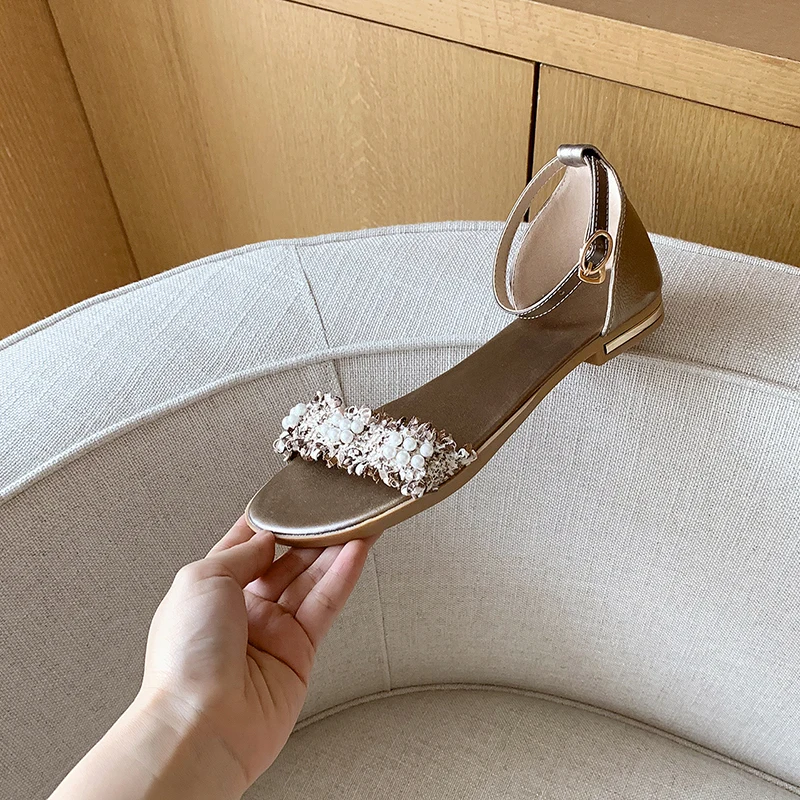 

Simple summer women's shoes with pearl cloth buckle flat heel sandals
