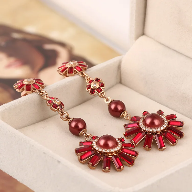 

European and American brand fashion red pearl flower long earrings