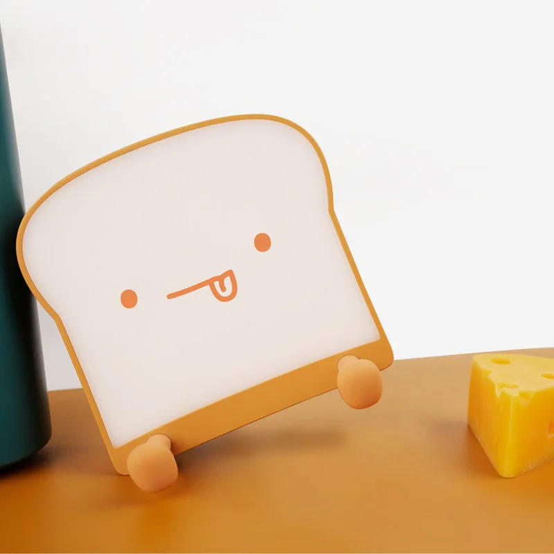 

Creative Cartoon Toast Bread Night Light Mobile Phone Holder Rechargeable Bedroom Bedside Silicone Atmosphere Lamp Gifts For Kid