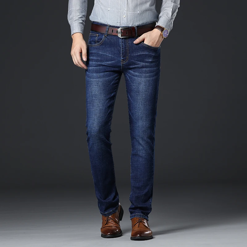 Мужские облегающие джинсы слегка расклешенные зауженные от известного бренда