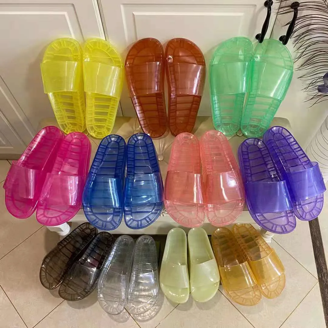 

Top Designer Women Transparent Crystal PVC Slippers Fashion Summer Men Flat Rubber Jelly Beach Sandals Luxurys Ladies