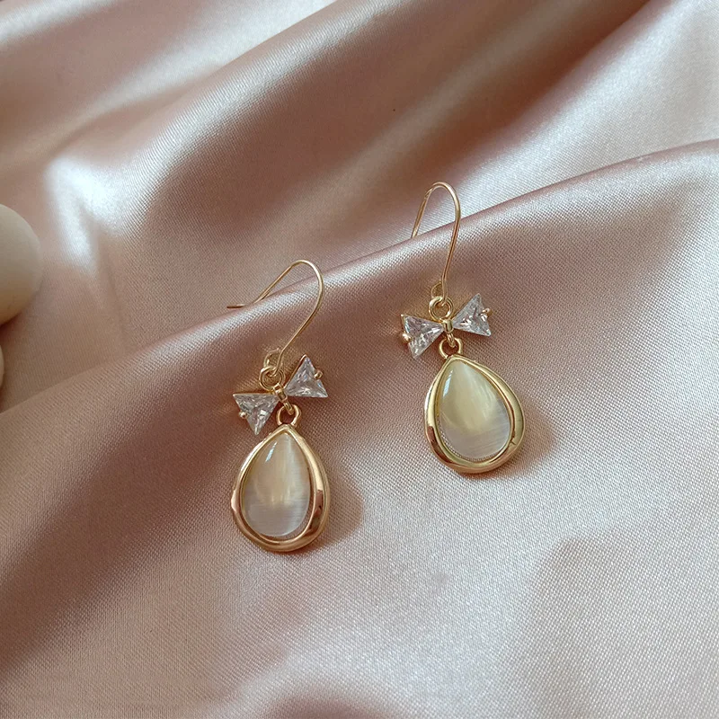 

W160 South Korea's new bow knot zircon cat eye water drop simple and small net red temperament ear hook ear jewelry