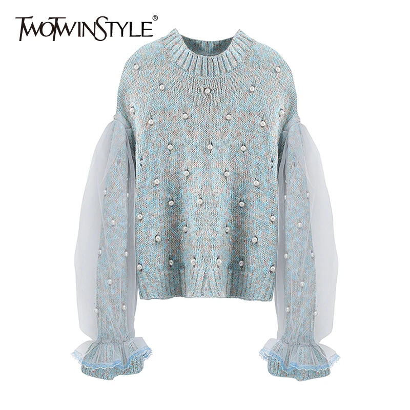 Женский трикотажный свитер TWOTWINSTYLE осенний с круглым вырезом и расширяющимся