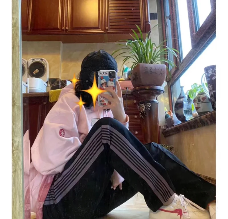 Спортивные штаны для отдыха и спорта мужчин женщин розовые полосатые